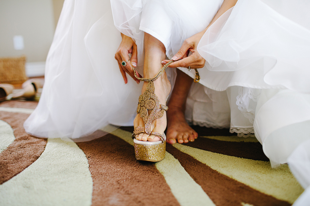 Here is a photo of Parisa putting on her wedding shoes.