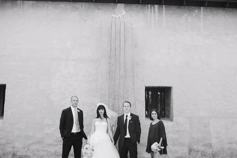 This is a Bridal Party photo at the San Juan Capistrano Mission.