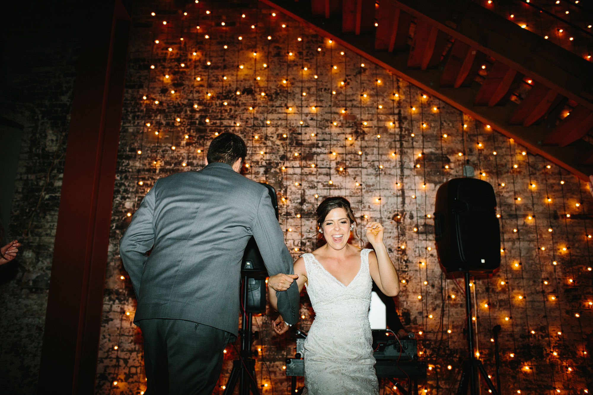 This is a photo of Rachel and Seth cutting a rug!