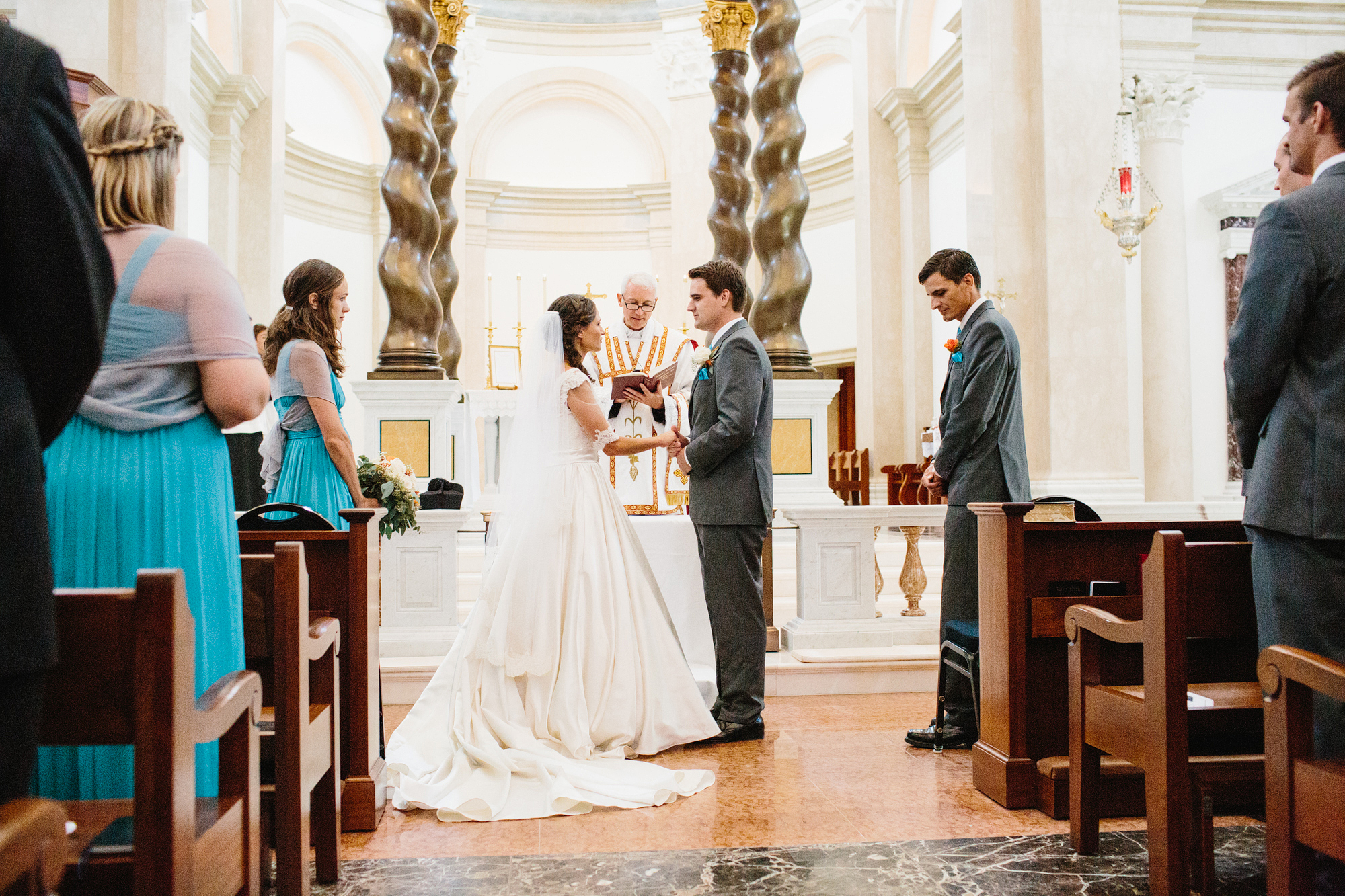 This is a photo of Annie and Chris standing at the front of the church.