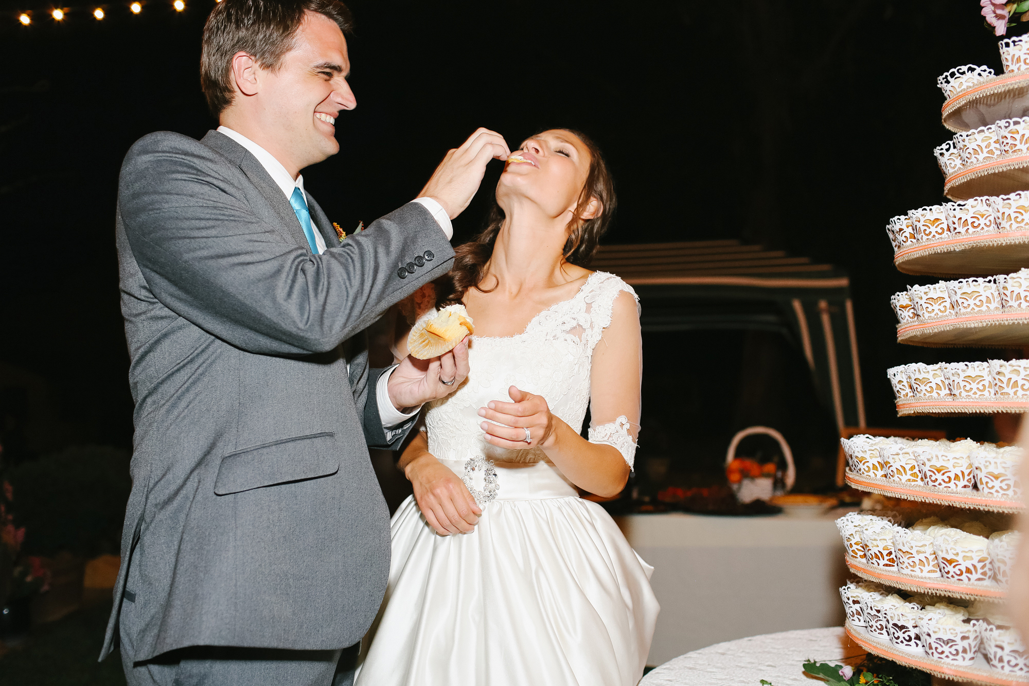 This is the cupcake cutting at their reception.