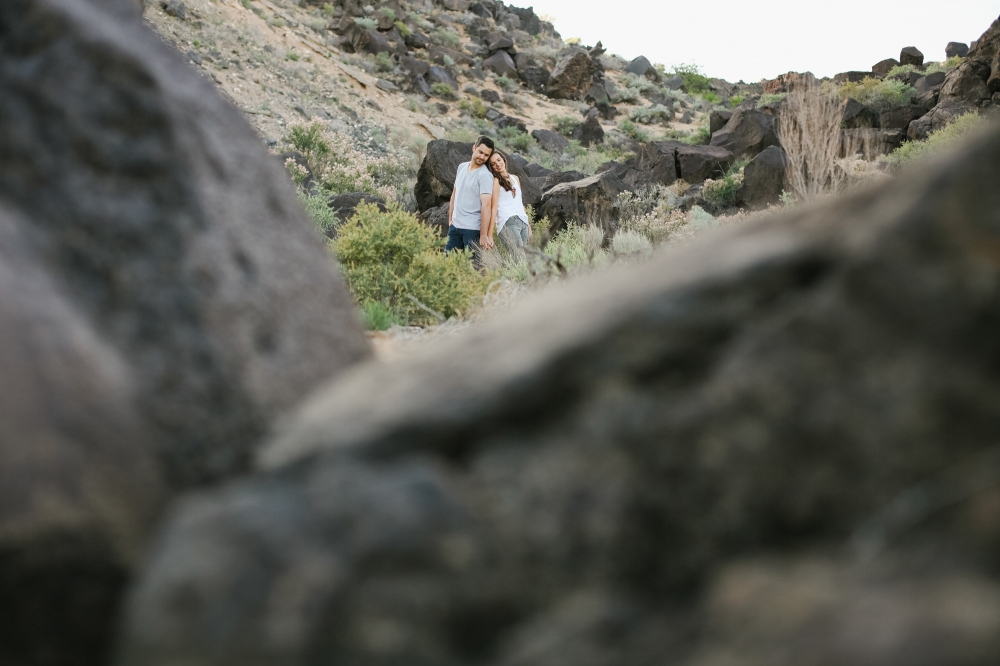 This is a cool composition where the couple is framed in the lava rock.