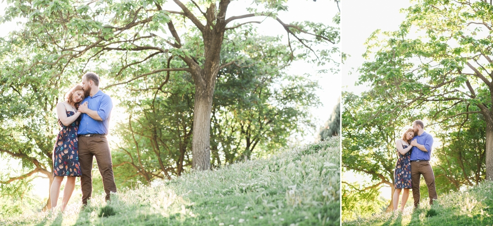 Tonya and Nick posing on a hill during their engagement session.