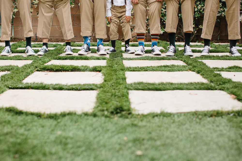 The boys all wore different socks and converse. 