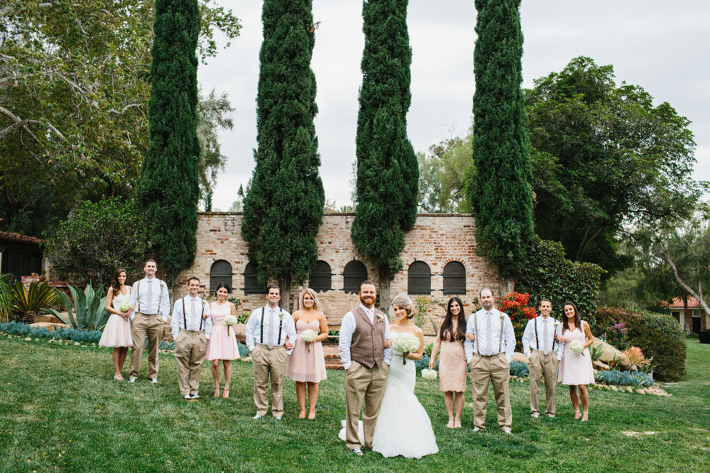 The bride and groom took a photo with the whole wedding party before the ceremony. 