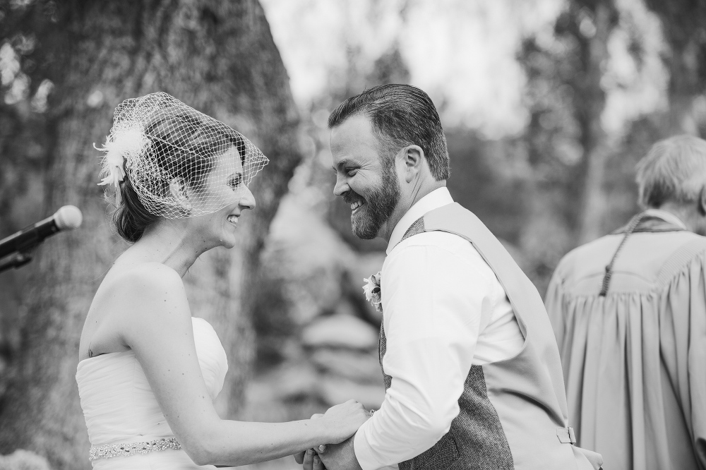 Here is a cute moment of the bride and groom smiling at each other. 