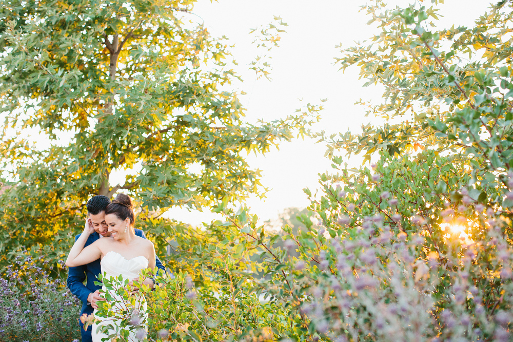 This photo is of the bride and groom in the gardens. 