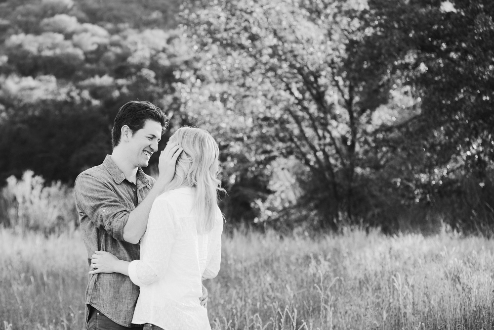 A black and white photo of Lauren and Alex at their engagement session. 