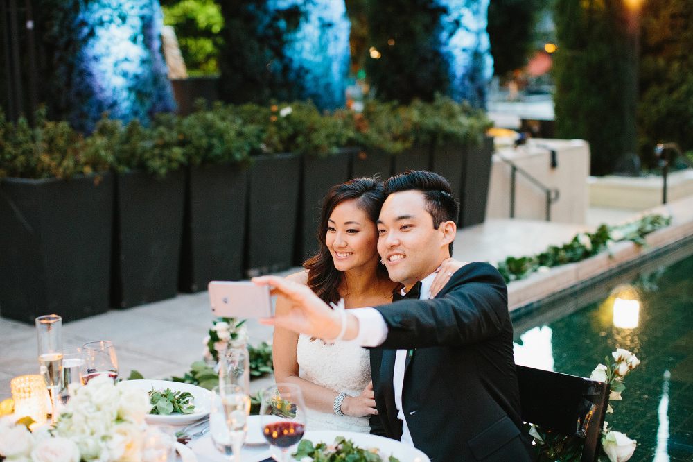 The bride and groom took a selfie. 