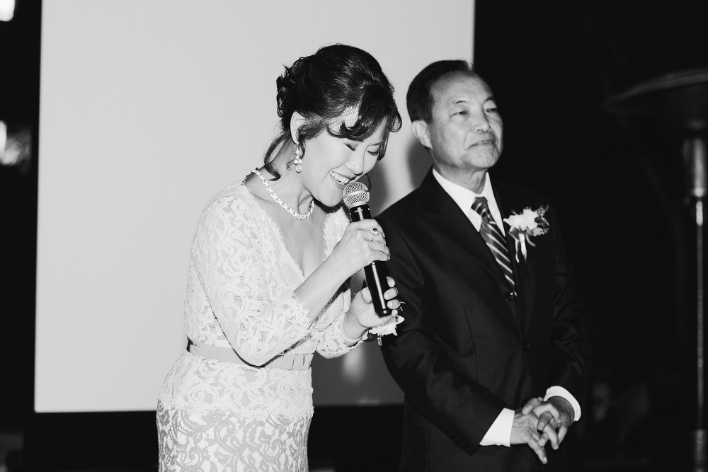 The parents giving a toast. 