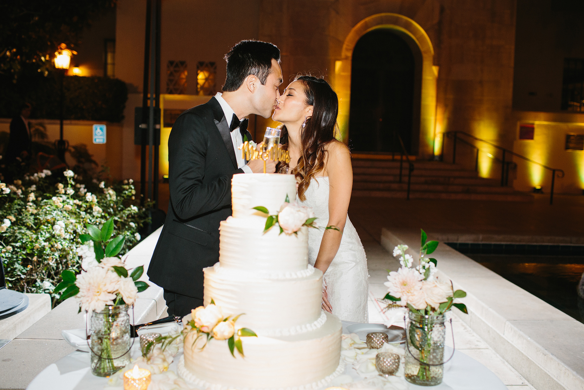 The bride and groom during cake cutting. 