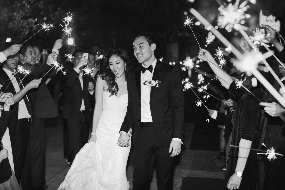 The bride and groom during the sparkler exit. 