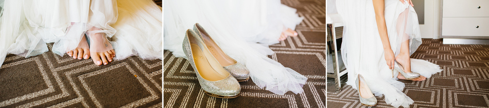 The bride putting on her wedding shoes. 