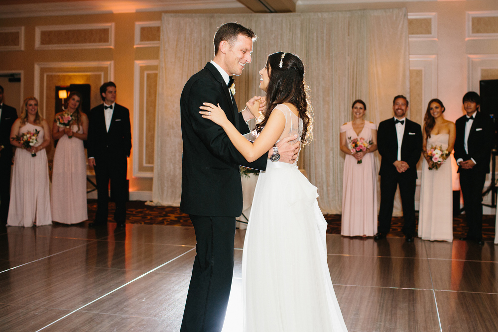 The bridal party watching the first dance. 