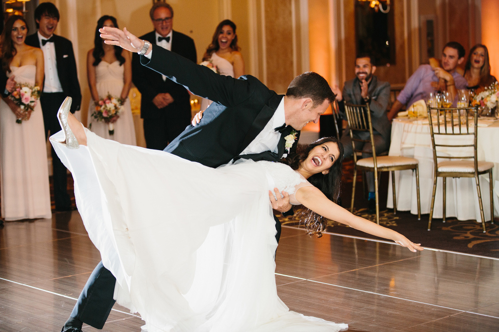 The couple ended their first dance with a dip. 