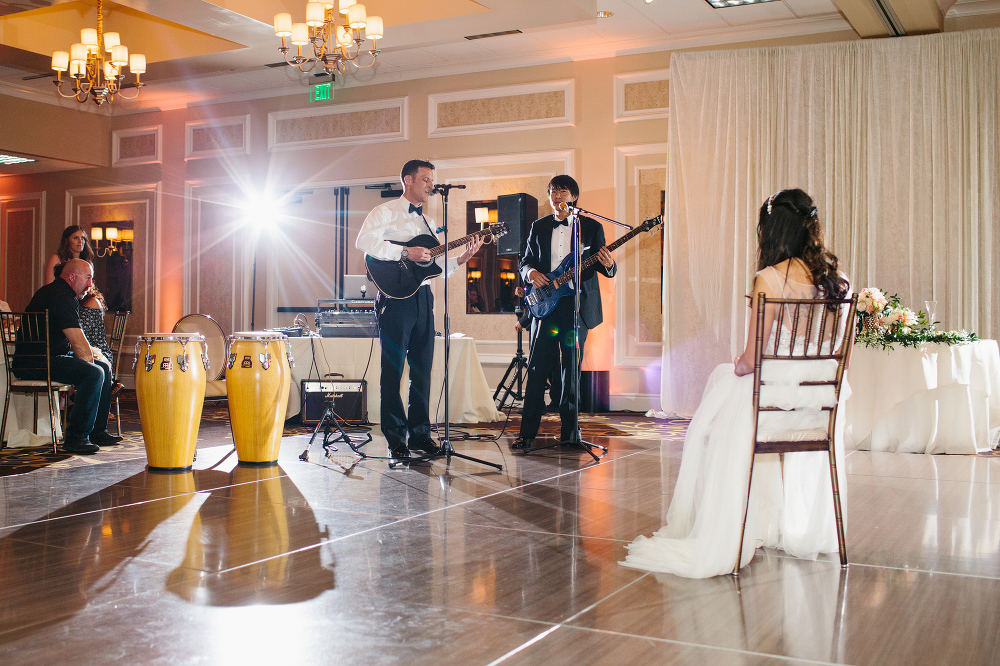 The groom played a special song for the bride. 
