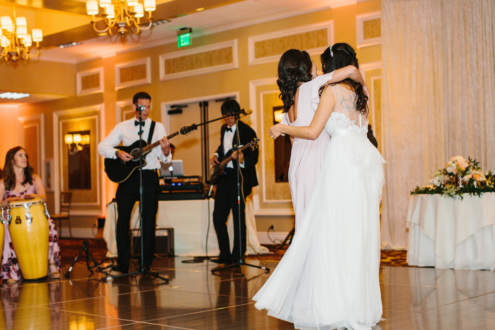 Cristina dancing with her maid of honor.