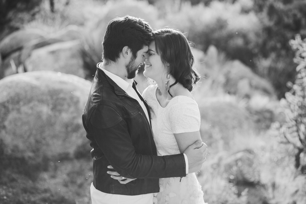 A sweet moment of the couple touching foreheads. 