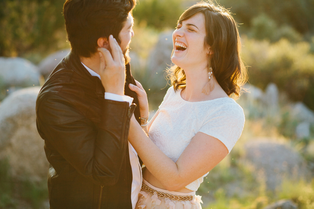 Another photo of Jacqueline and Chris laughing. 