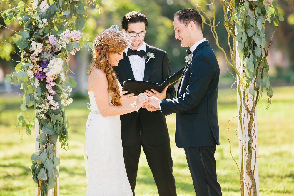 Carrie and Justin exchanging rings. 