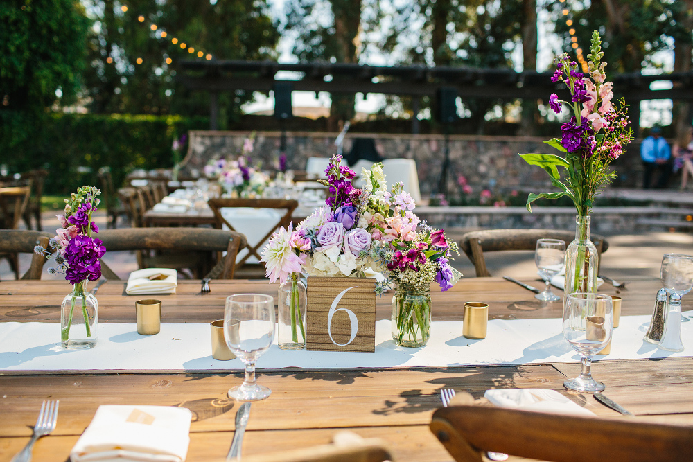 A photo of the purple flower centerpieces.