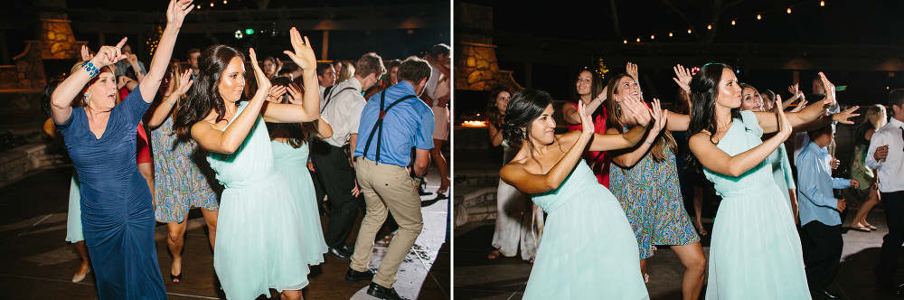 The bridal party dancing together. 