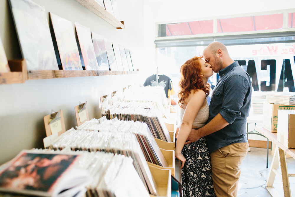 Part of the engagement session was in a record shop. 