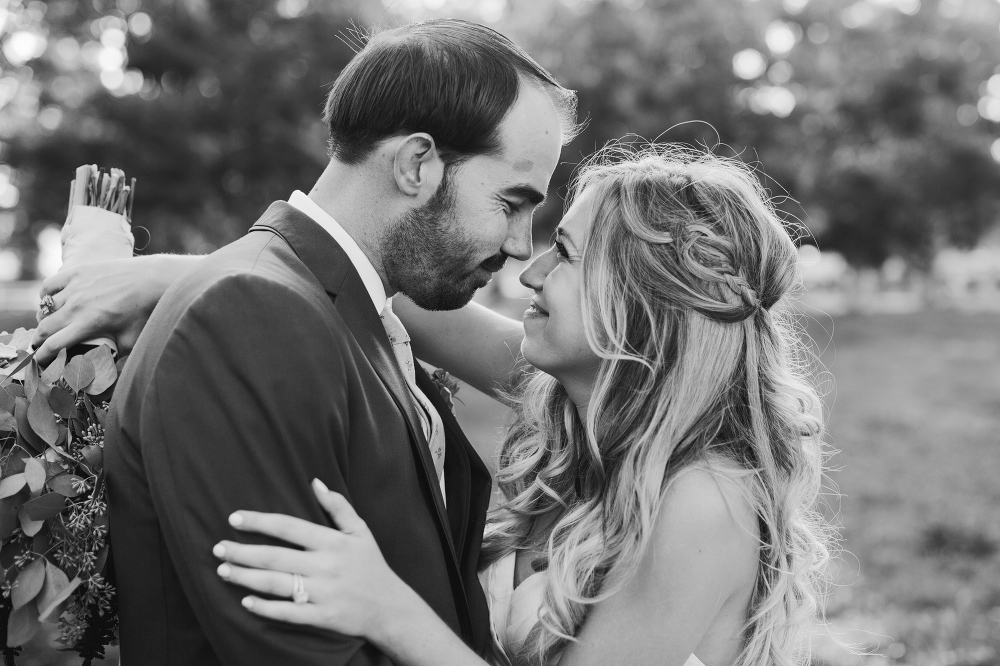 A sweet photo of the couple smiling. 