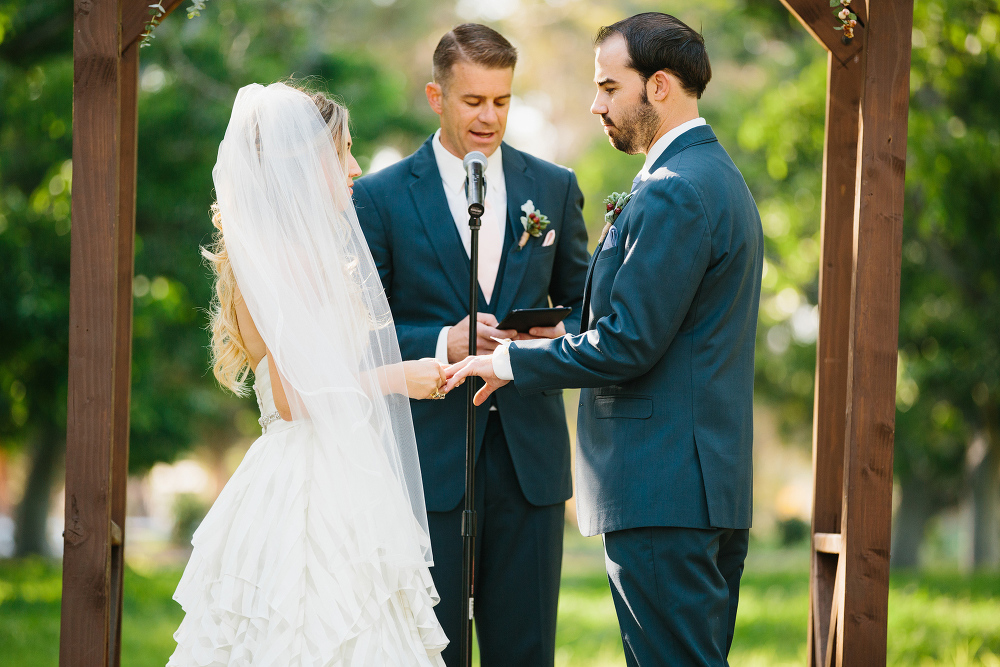 The couple exchanging rings. 