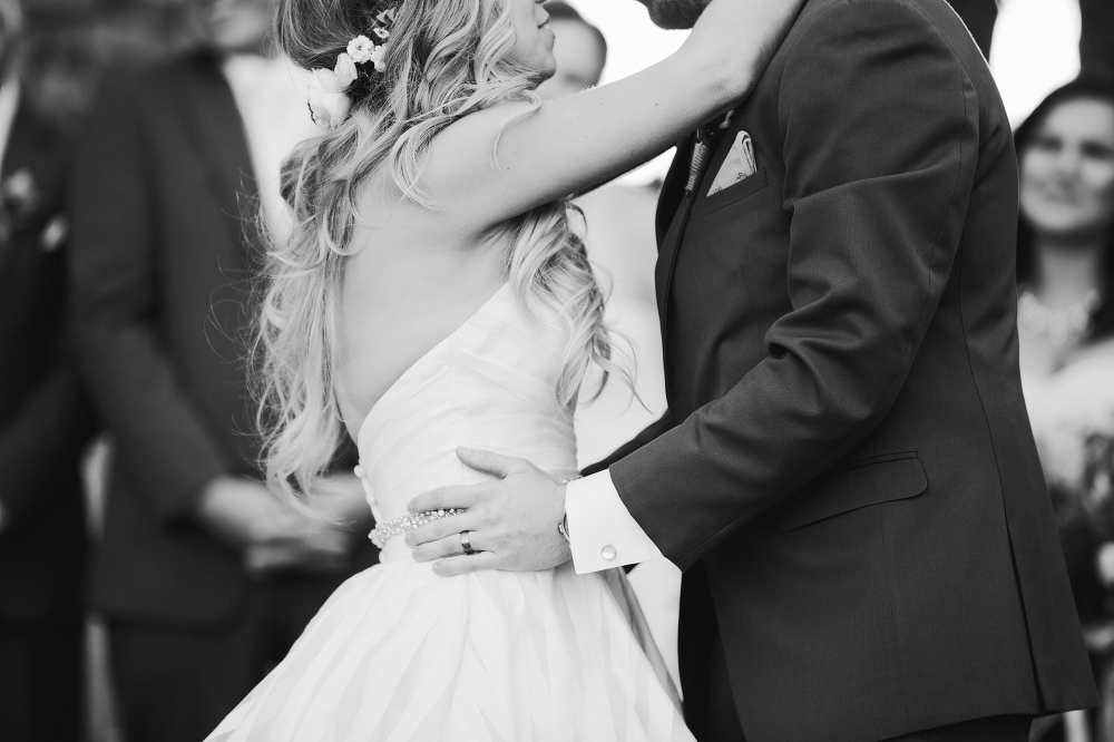A sweet photo of the couple dancing. 