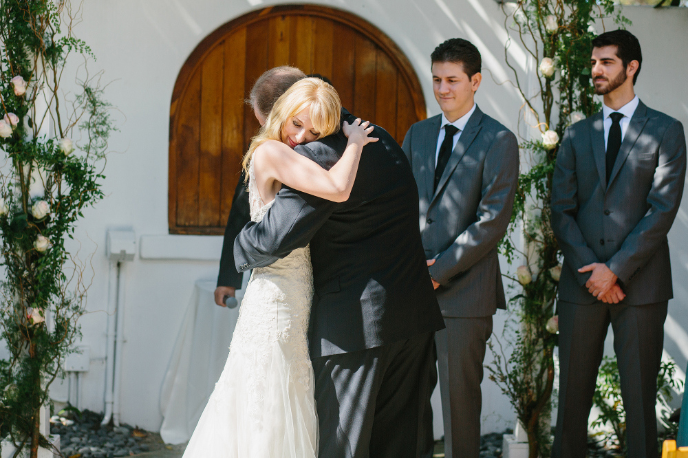 Lauren having a sweet moment with her dad as he gives her away. 