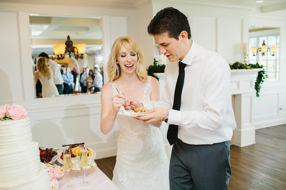 Lauren and Alex cutting the cake. 