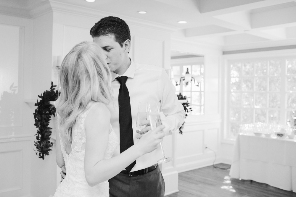 A sweet kiss after cake cutting. 