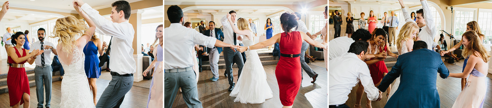 Guests dancing around the bride and groom. 