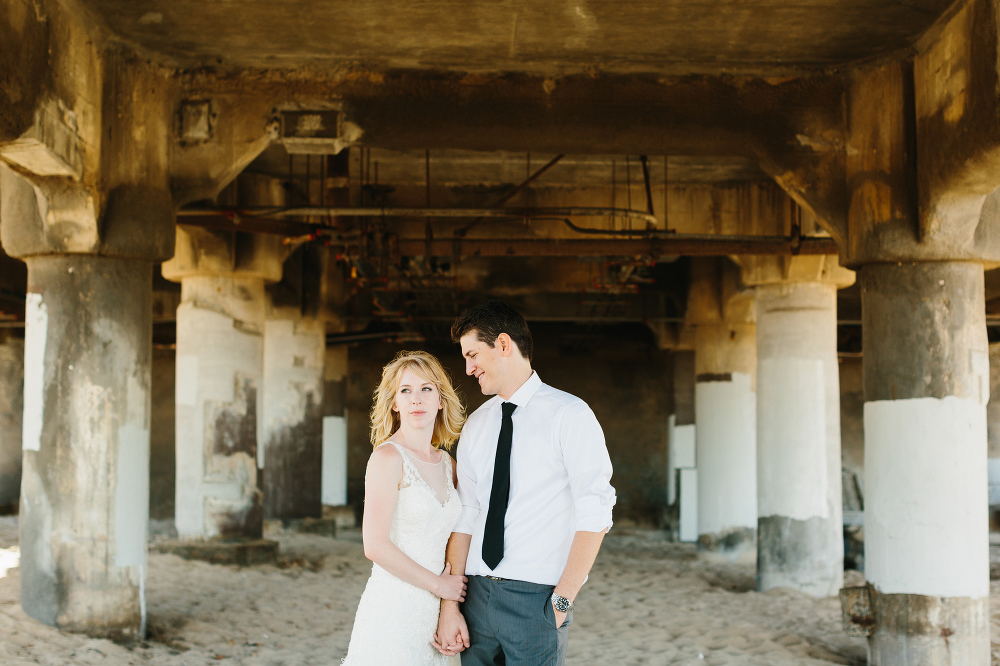 Lauren and Alex under the pier. 