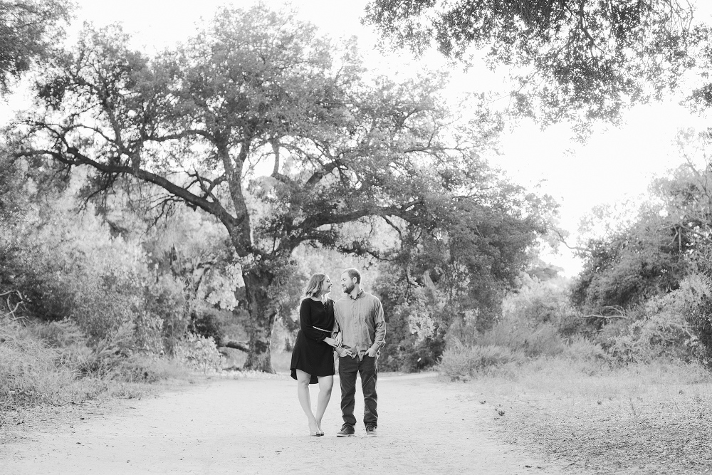 Hillary and CJ on a dirt path. 