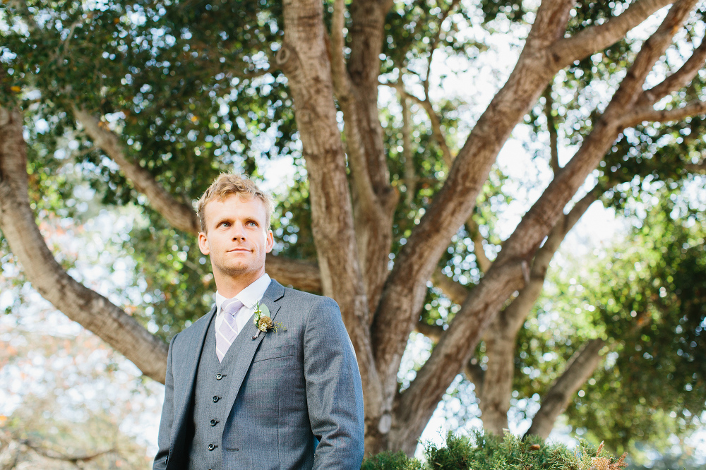 A portrait of Brody under a large tree. 