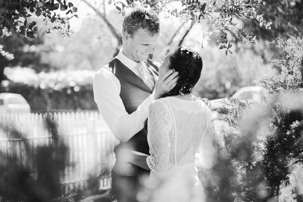 A black and white photo of the bride and groom. 