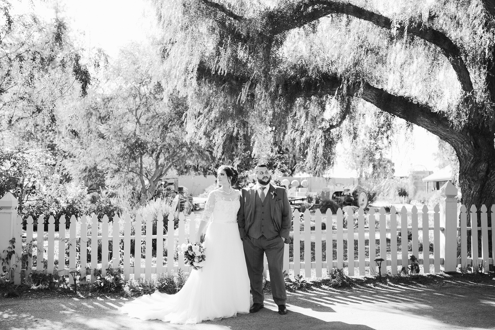 Steven and Samara in front of the pickett fence. 