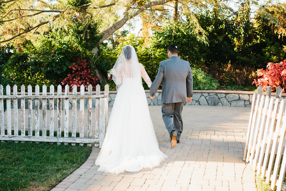 Steven and Samara walking together after the ceremony. 