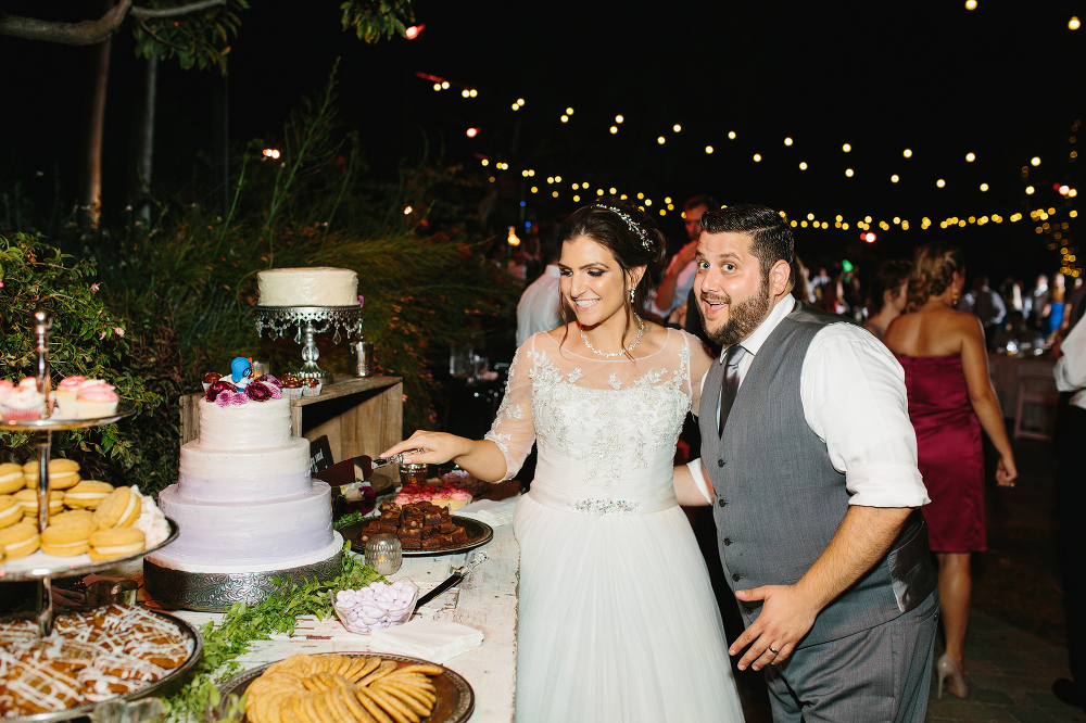 Steven and Samara cutting the cake. 