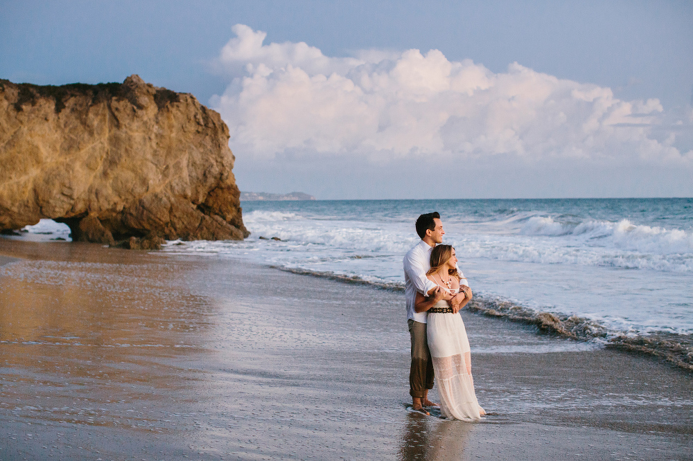 A beautiful photo of the couple on the beach. 