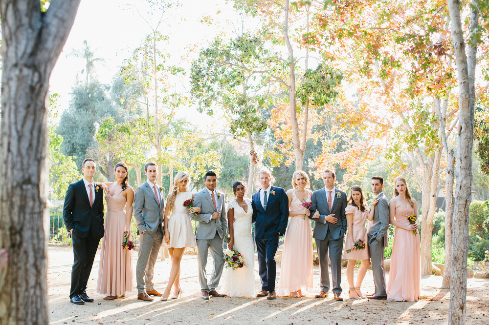 The full wedding party at the park. 