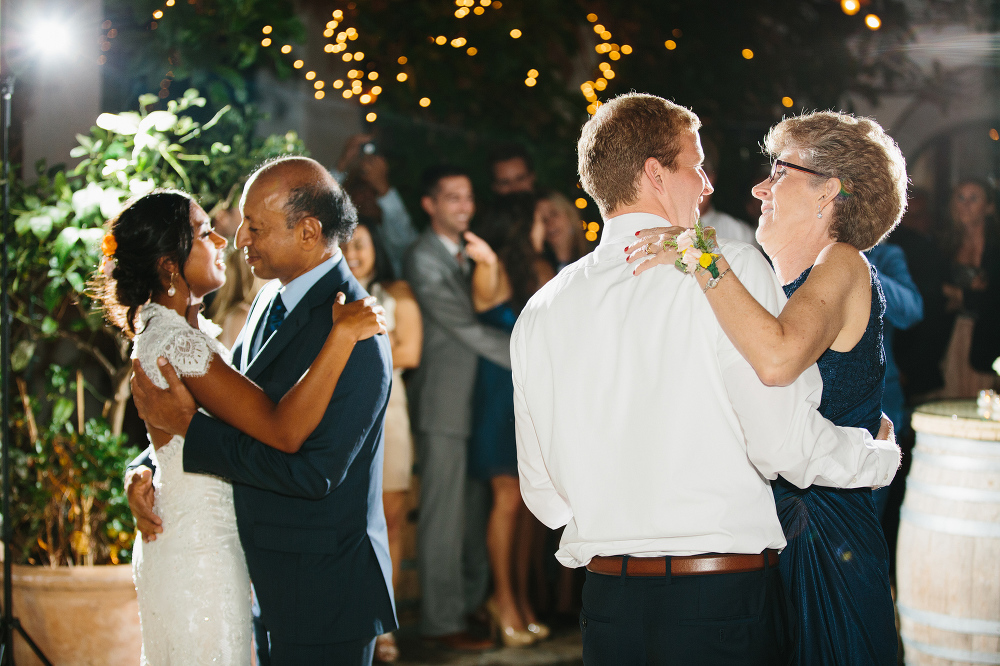 Anita and Matt dancing with their parents. 