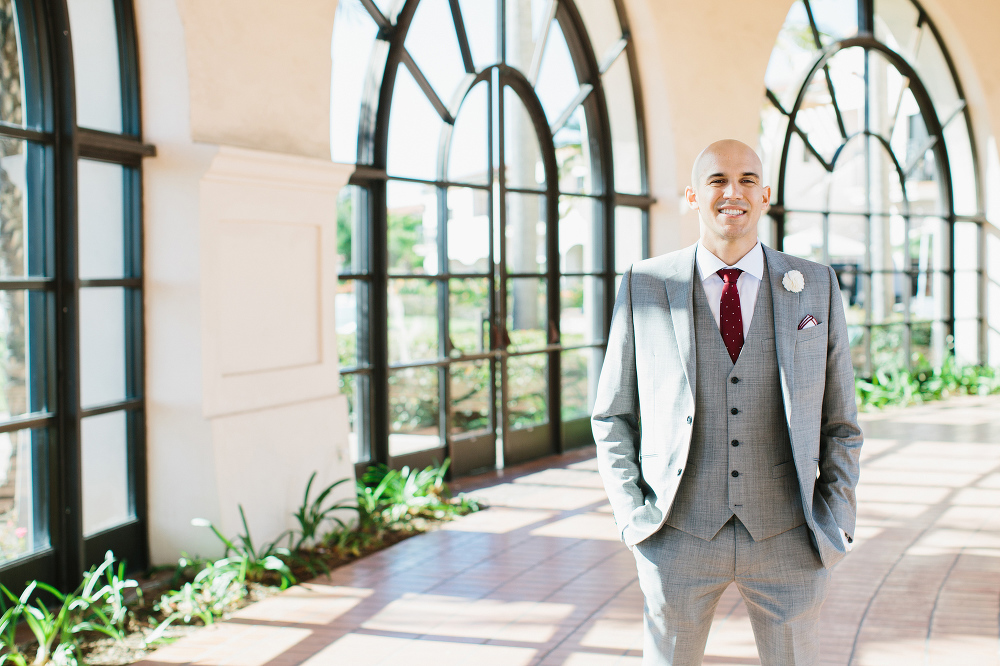 The groom dressed in his three-piece suit. 