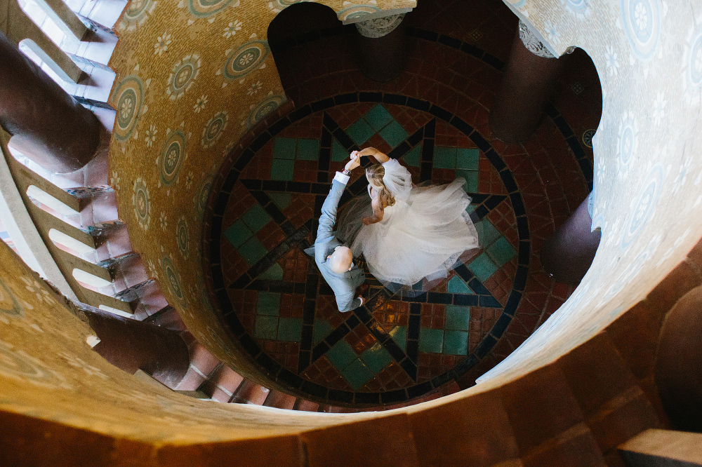 Bailey and Phil dancing at the bottom of the staircase. 