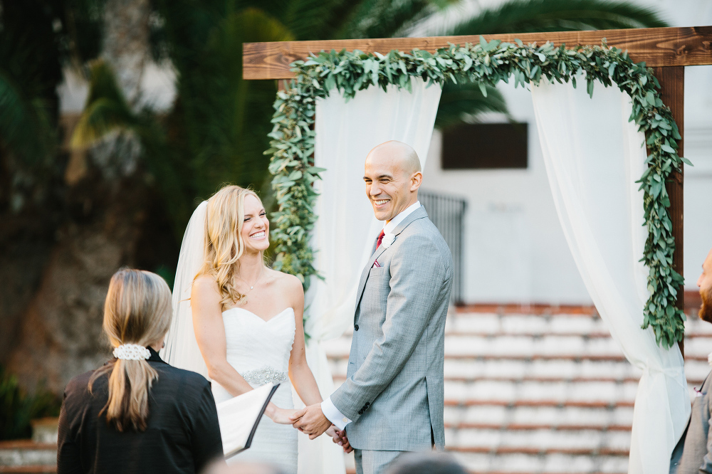 A cute photo of the couple laughing during the ceremony. 