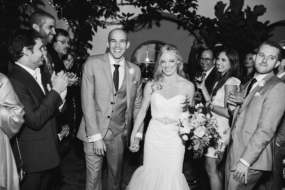 The bride and groom entering the reception. 