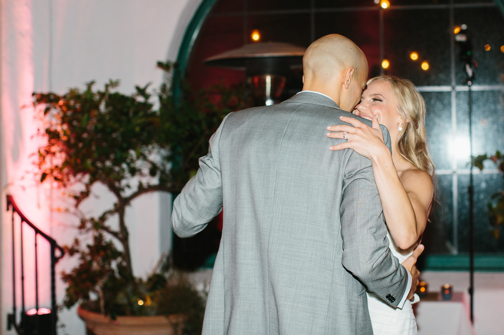 Bailey and Phil smiling during the first dance. 