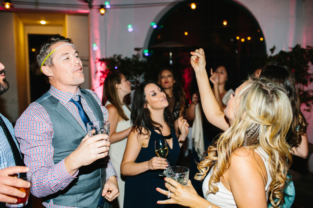 Wedding guests singing along with the music. 